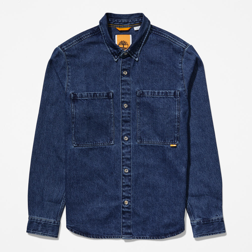 Blue denim TimberlandÂ® Outdoor Heritage Denim Earth Keepers Overshirt for Men.Â Regular fit for comfort.Â Button-up front with chest pockets.Â Part of the TimberlandÂ® Earth KeepersÂ® collection.
