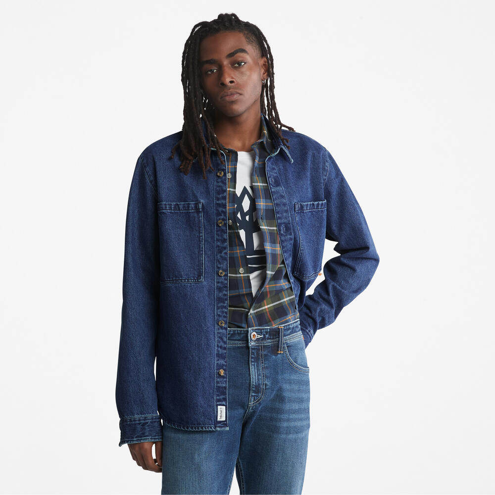 Blue denim TimberlandÂ® Outdoor Heritage Denim Earth Keepers Overshirt for Men.Â Regular fit for comfort.Â Button-up front with chest pockets.Â Part of the TimberlandÂ® Earth KeepersÂ® collection.