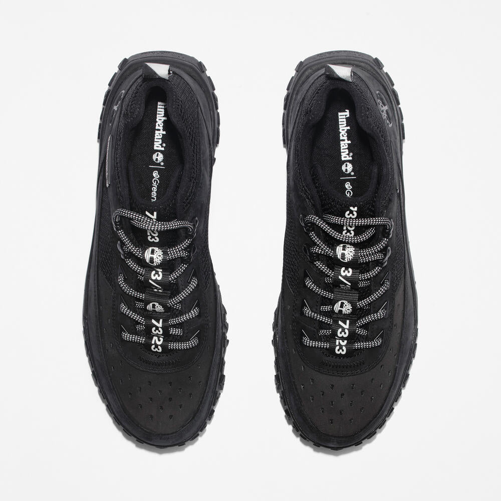 Timberland GreenStride Motion 6 Sneaker Boot for Men in Black. Black sneaker boot for all-day comfort and style. GreenStride midsole for eco-conscious cushioning. ReBOTL recycled lining. Supportive design with lace-up closure. Rubber outsole for everyday traction. Versatile for everyday wear, light hikes, or city adventures.
