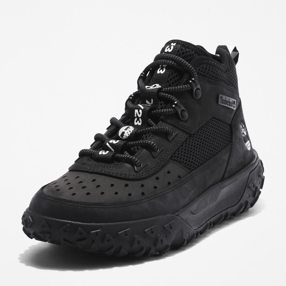 Timberland GreenStride Motion 6 Sneaker Boot for Men in Black. Black sneaker boot for all-day comfort and style. GreenStride midsole for eco-conscious cushioning. ReBOTL recycled lining. Supportive design with lace-up closure. Rubber outsole for everyday traction. Versatile for everyday wear, light hikes, or city adventures.