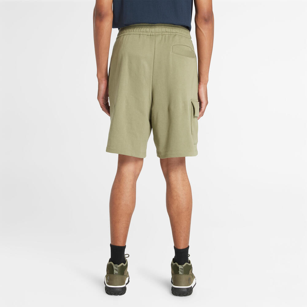 Timberland Northwood Logo Cargo Brushback Sweatshort. Men's cargo shorts with a brushback interior for warmth. Features cargo pockets and a relaxed fit. Ideal for casual wear and outdoor activities.
