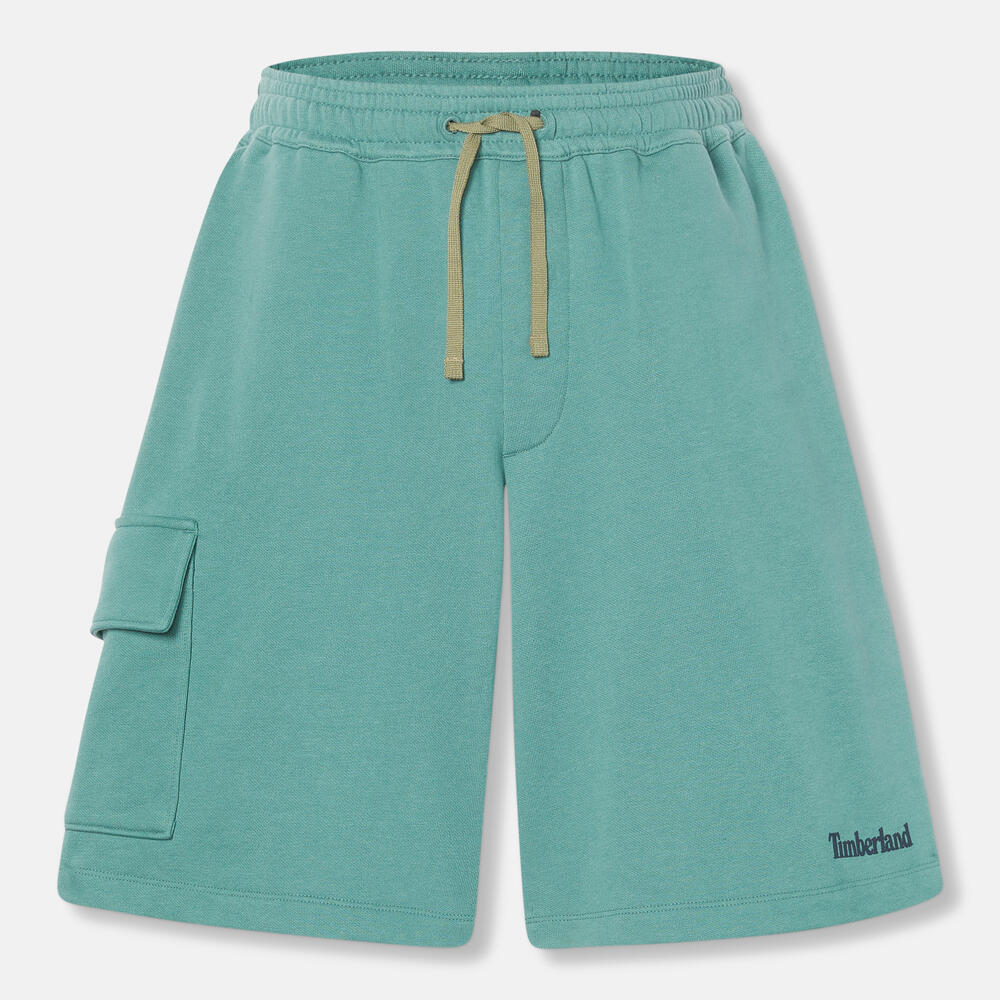 Timberland® Northwood Logo Cargo Brushback Sweatshort. Men's cargo shorts with a brushback interior for warmth. Features cargo pockets and a relaxed fit. Ideal for casual wear and outdoor activities.