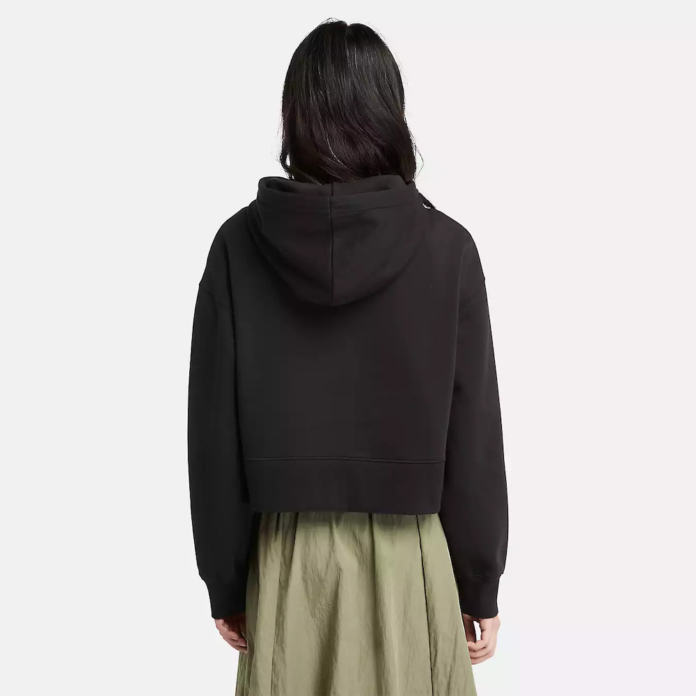 Black Timberland Brushed Back Logo Hoodie for Women. Soft, breathable cotton blend with brushed-back fleece for warmth. Relaxed fit, cropped silhouette (18.0" center back length). Adjustable hood for warmth and coverage. Ribbed cuffs and hem for a snug fit