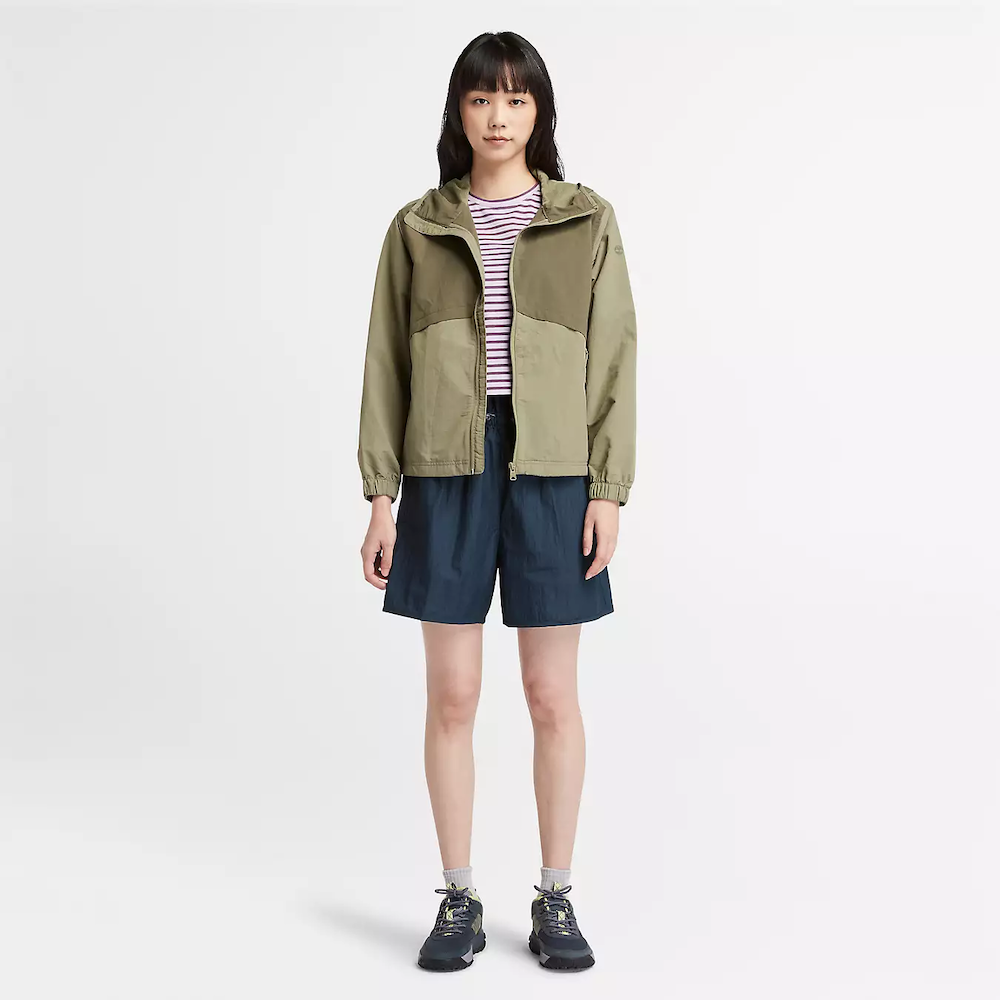 Striped Timberland Crop Short Sleeve Tee for Women. Soft, breathable cotton blend fabric. Relaxed fit for comfort. Cropped silhouette for a trendy look. Ribbed collar for a snug fit. Classic striped pattern for nautical style