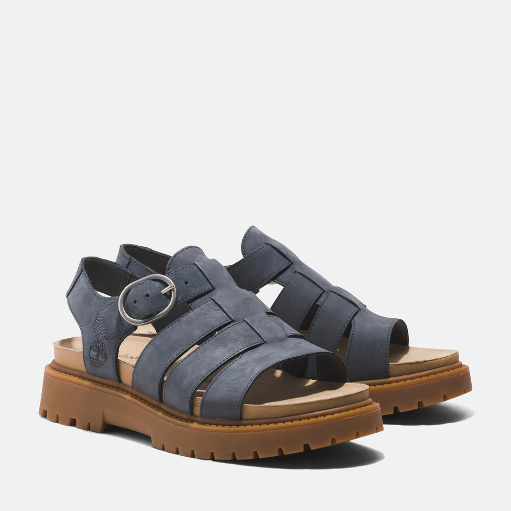 Timberland® Women's Clairemont Way Fisherman Sandal. Leather sandal with adjustable buckle closure, OrthoLite® footbed, and comfortable design.  Perfect for warm weather adventures. 