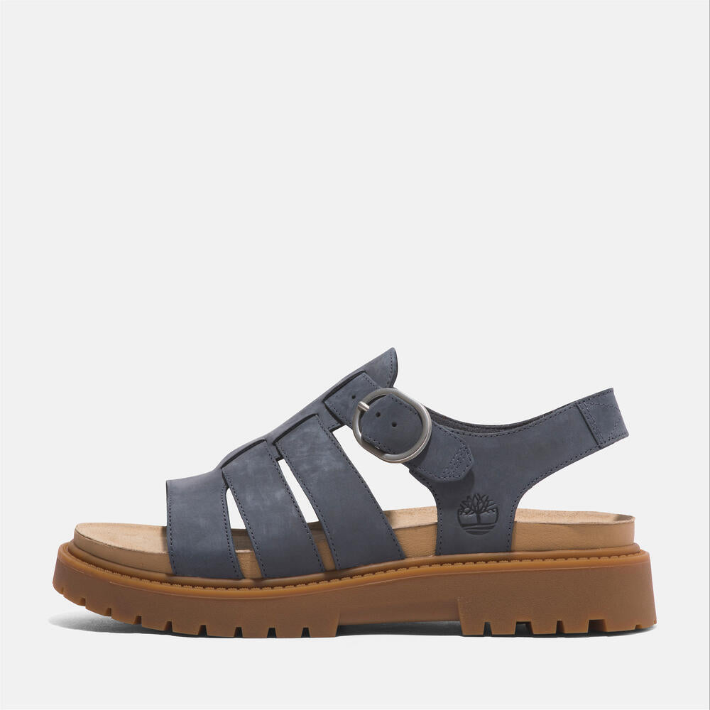 Timberland® Women's Clairemont Way Fisherman Sandal. Leather sandal with adjustable buckle closure, OrthoLite® footbed, and comfortable design.  Perfect for warm weather adventures. 