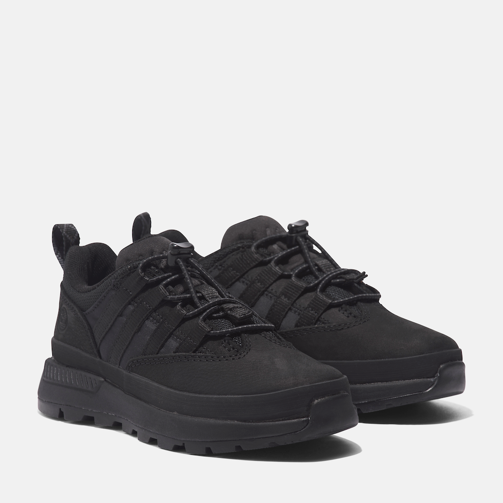 Timberland® Euro Trekker Low Lace Up Sneaker for Junior. Jet black sneaker featuring a lace-up closure for a secure fit, comfortable footbed, and lugged outsole for traction. Made with partly recycled materials. Pairs well with various outfits for everyday wear or light adventures.