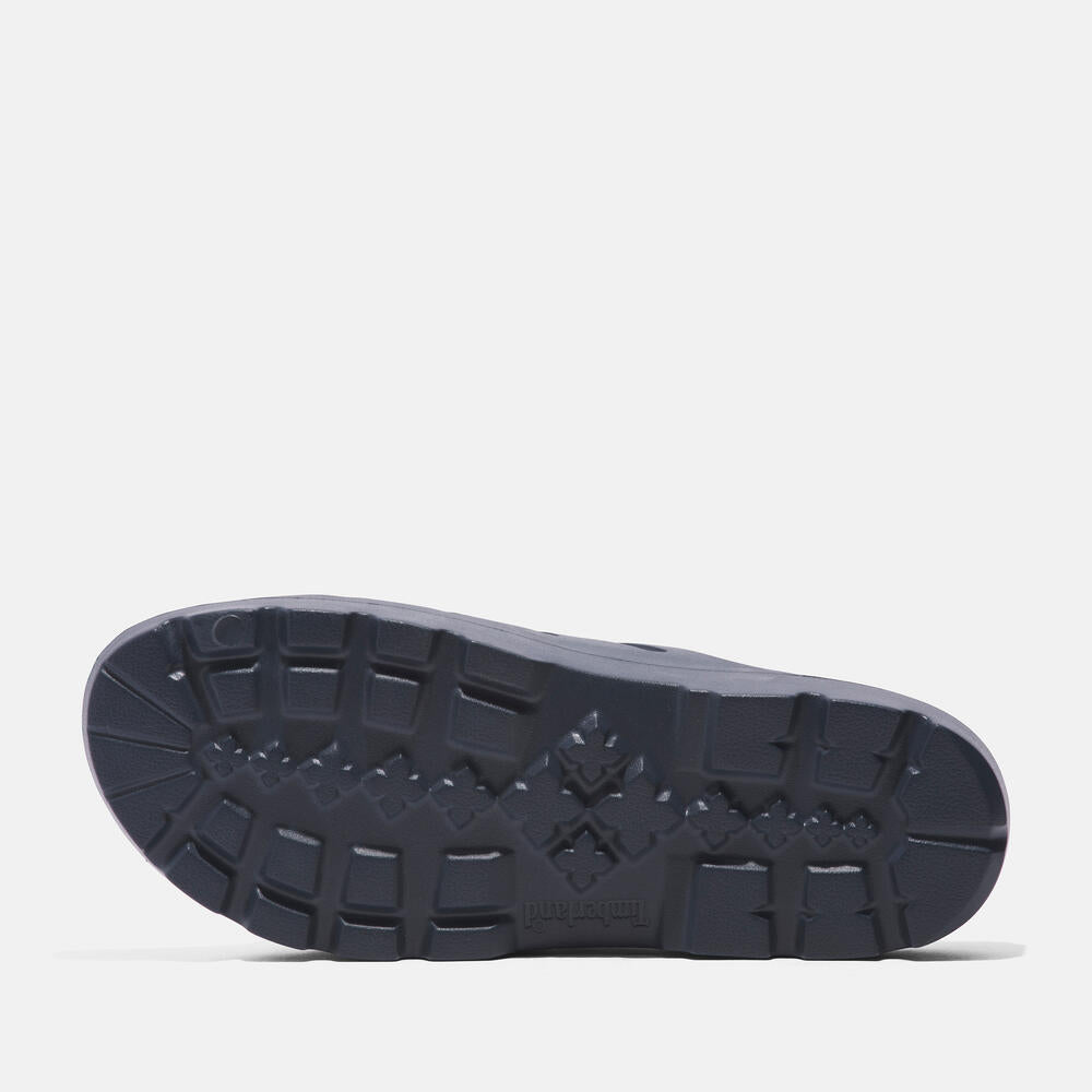 Timberland Get Outslide Slide Sandal for Men in Dark Blue. Dark blue slide sandal with one-piece EVA upper and outsole for lightweight comfort.  Perfect for casual wear and lounging