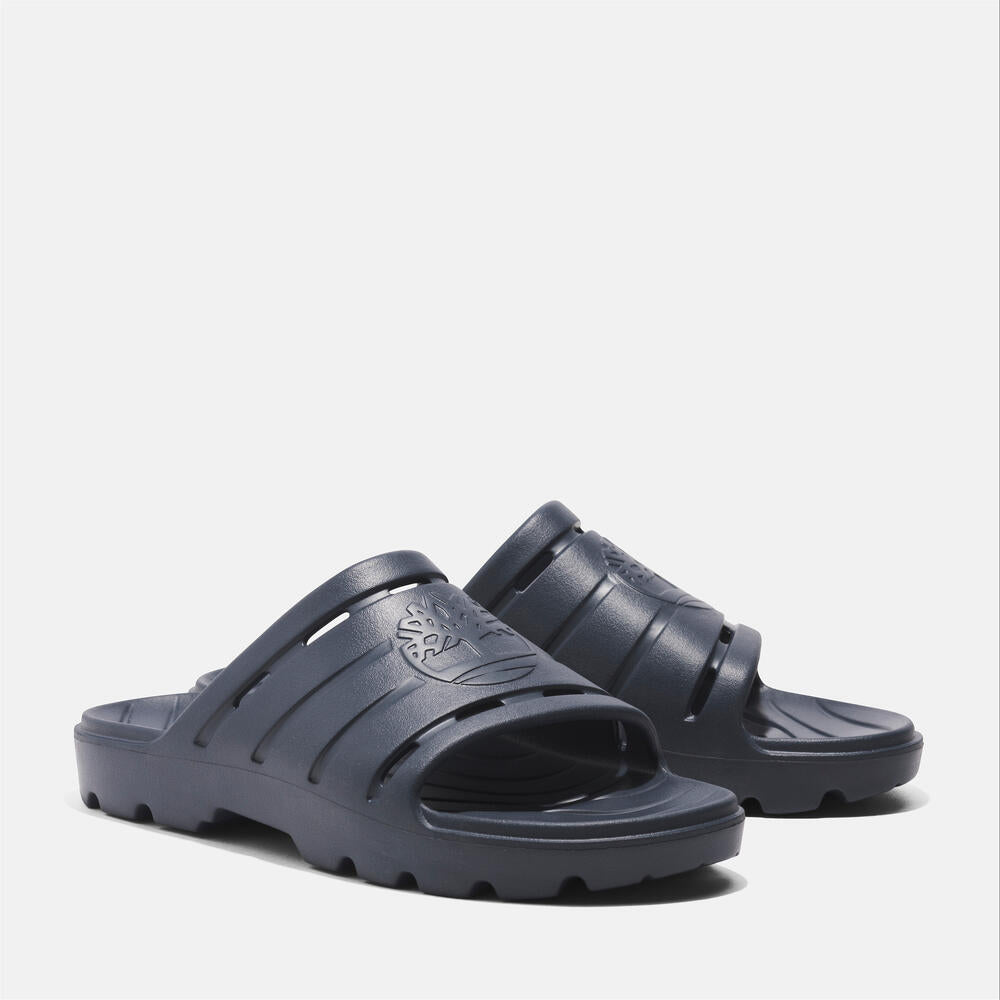 Timberland Get Outslide Slide Sandal for Men in Dark Blue. Dark blue slide sandal with one-piece EVA upper and outsole for lightweight comfort.  Perfect for casual wear and lounging