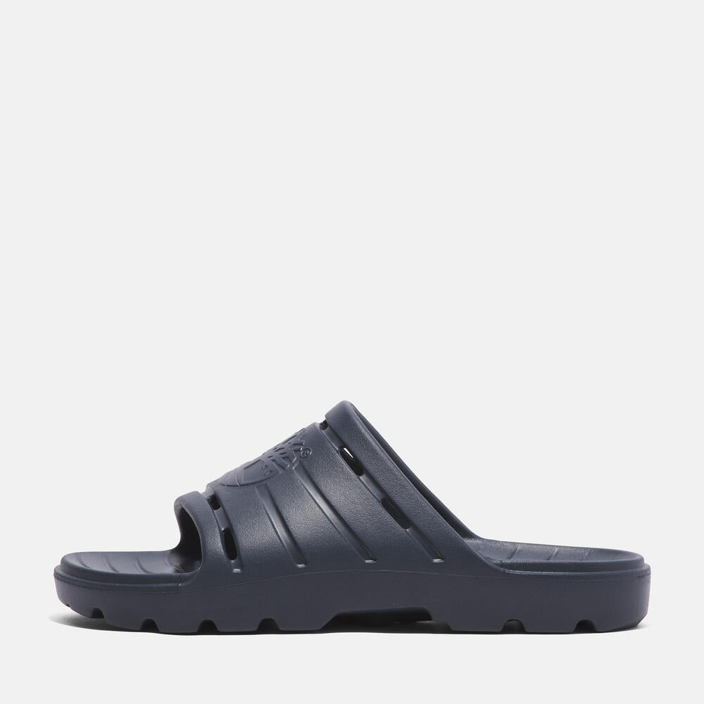 Timberland Get Outslide Slide Sandal for Men in Dark Blue. Dark blue slide sandal with one-piece EVA upper and outsole for lightweight comfort.  Perfect for casual wear and lounging