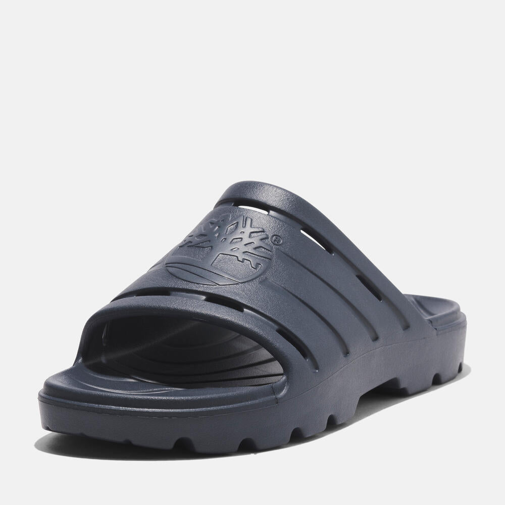 Timberland Get Outslide Slide Sandal for Men in Dark Blue. Dark blue slide sandal with one-piece EVA upper and outsole for lightweight comfort.  Perfect for casual wear and lounging