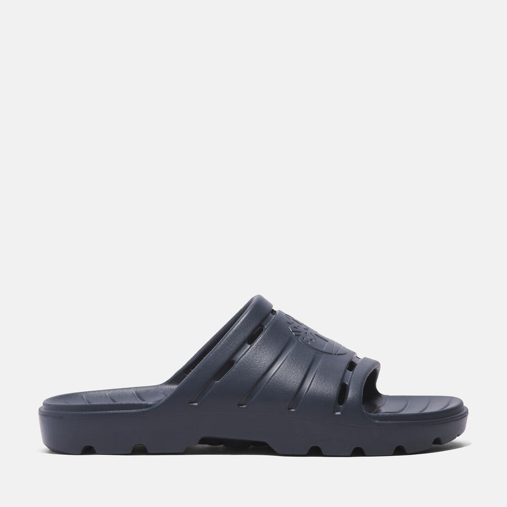 Timberland Get Outslide Slide Sandal for Men in Dark Blue. Dark blue slide sandal with one-piece EVA upper and outsole for lightweight comfort.  Perfect for casual wear and lounging