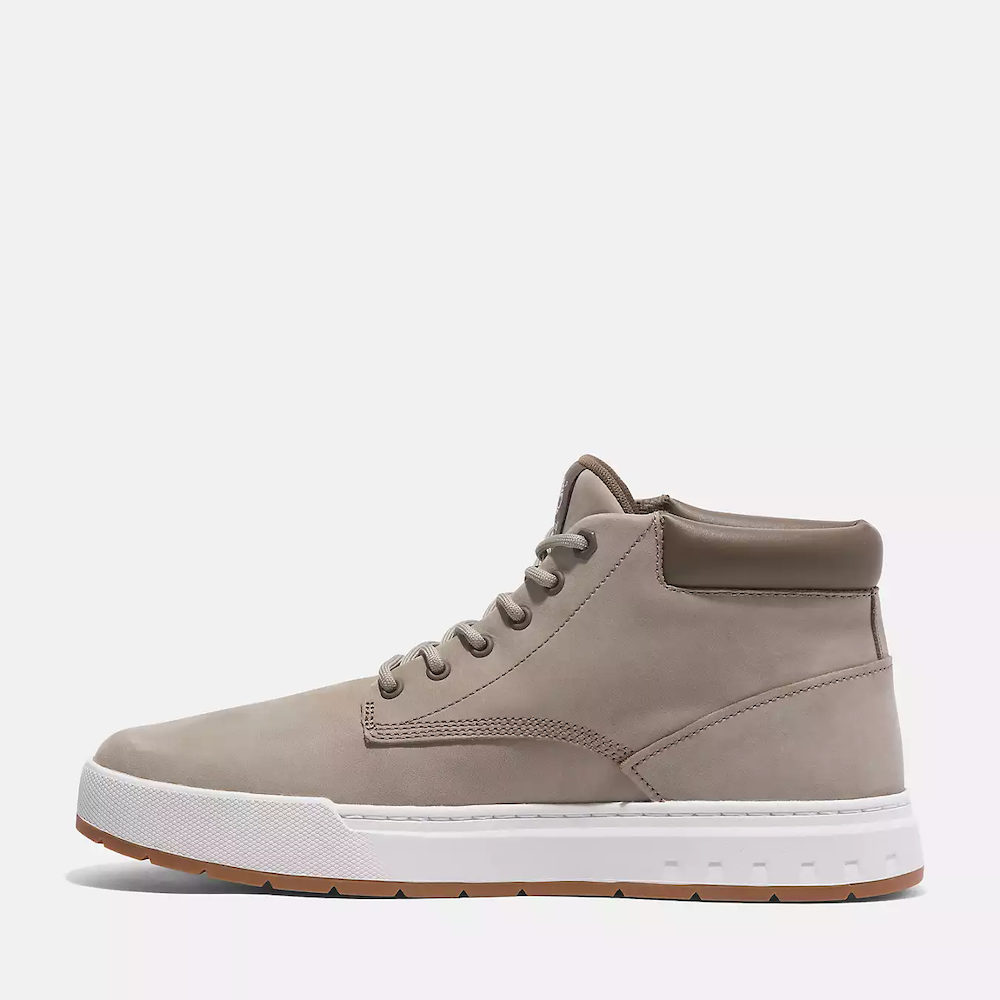 Timberland Maple Grove Mid Lace Up Sneaker for Men. Light taupe colored nubuck sneaker with lace-up closure, padded collar for comfort, and rubber sole for traction.  Pairs well with casual outfits.
