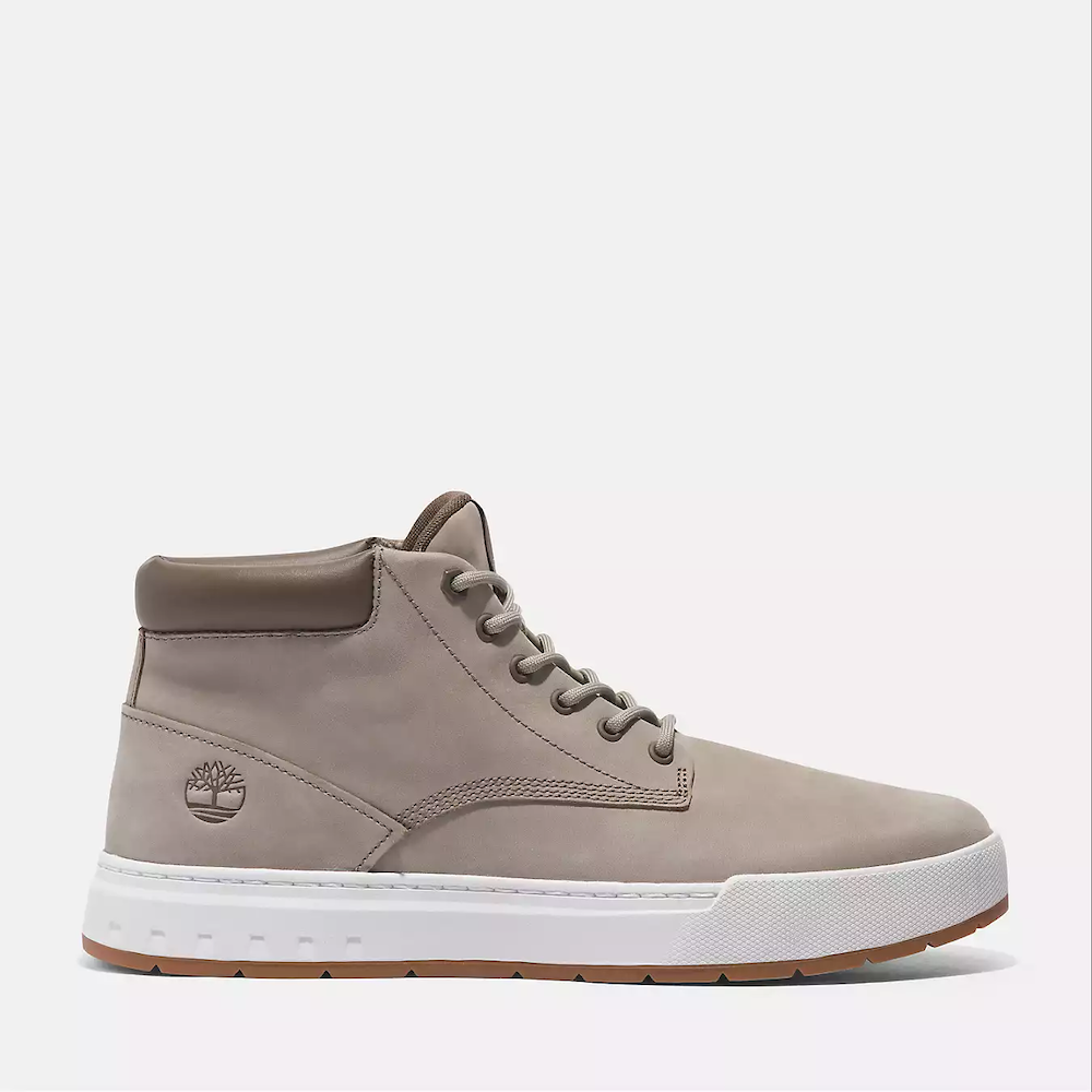 Timberland Maple Grove Mid Lace Up Sneaker for Men. Light taupe colored nubuck sneaker with lace-up closure, padded collar for comfort, and rubber sole for traction.  Pairs well with casual outfits.