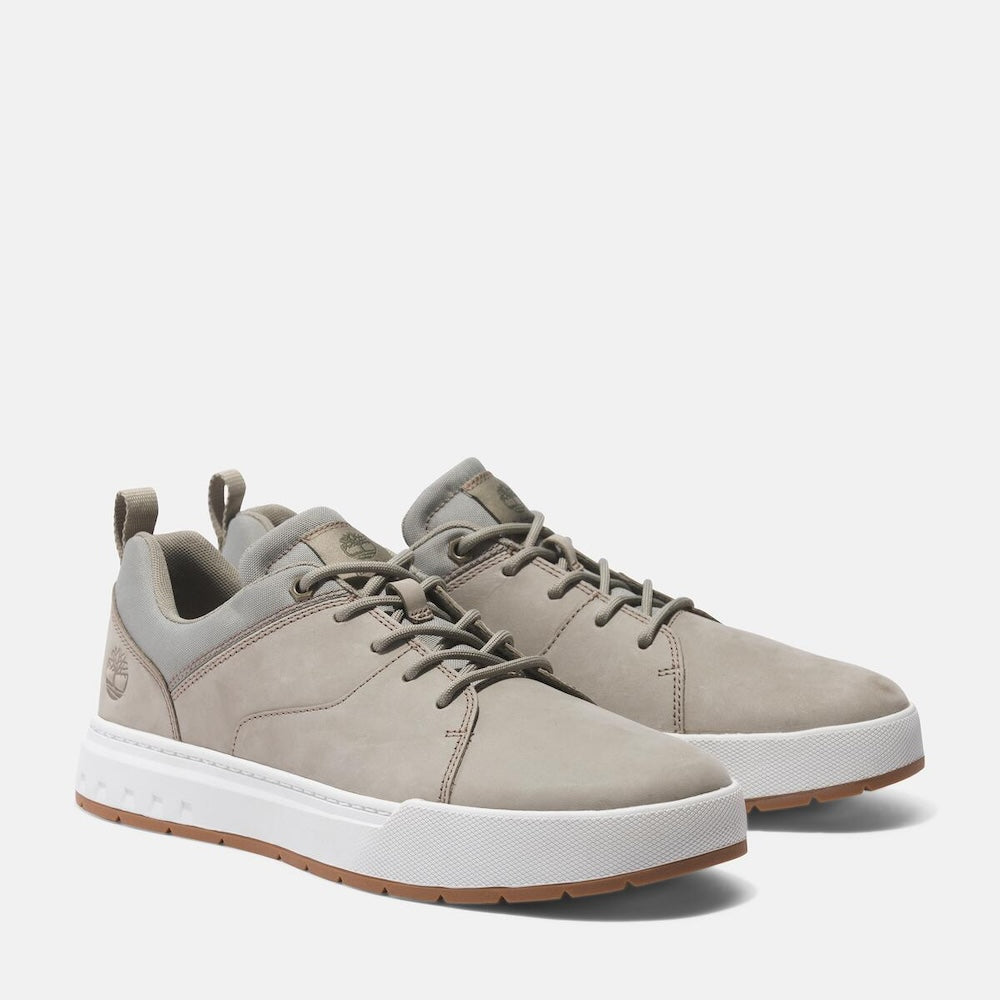 Timberland¡ Maple Grove Low Lace Up Sneaker for Men. Light taupe colored full grain leather sneaker with lace-up closure, comfortable lining made with recycled materials, and rubber outsole for traction. Perfect for everyday wear.