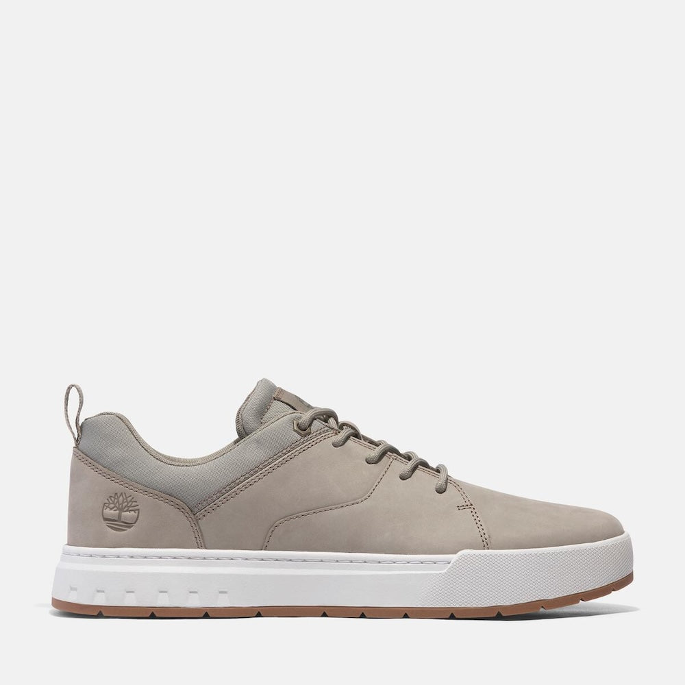 Timberland¡ Maple Grove Low Lace Up Sneaker for Men. Light taupe colored full grain leather sneaker with lace-up closure, comfortable lining made with recycled materials, and rubber outsole for traction. Perfect for everyday wear.