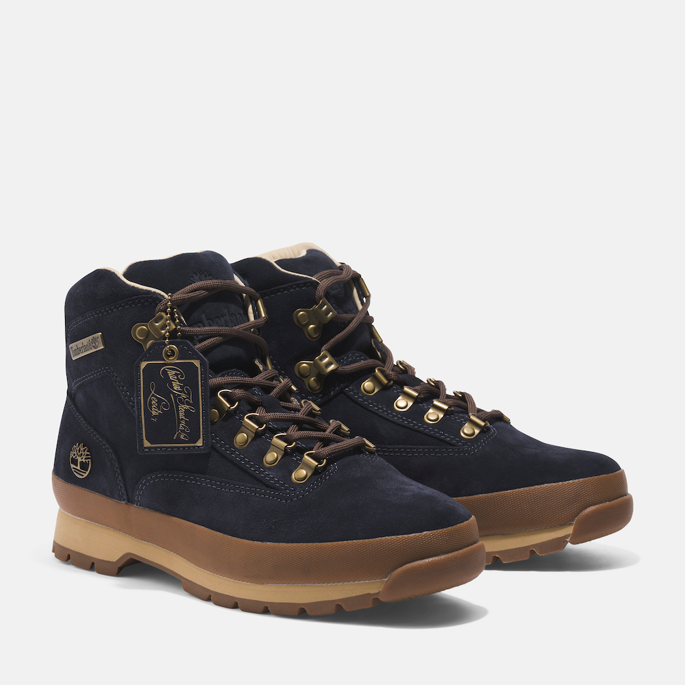 TimberlandÃ‚Â® C.F. SteadÃ¢â€žÂ¢ Indigo Suede Euro Hiker Mid Lace Up Boot for Men. Mid-cut, dark blue suede hiking boot crafted with premium leather by C.F. SteadÃ¢â€žÂ¢. Features waterproof construction, supportive steel shank, lug sole for grip, and mid-ankle laces for a secure fit.