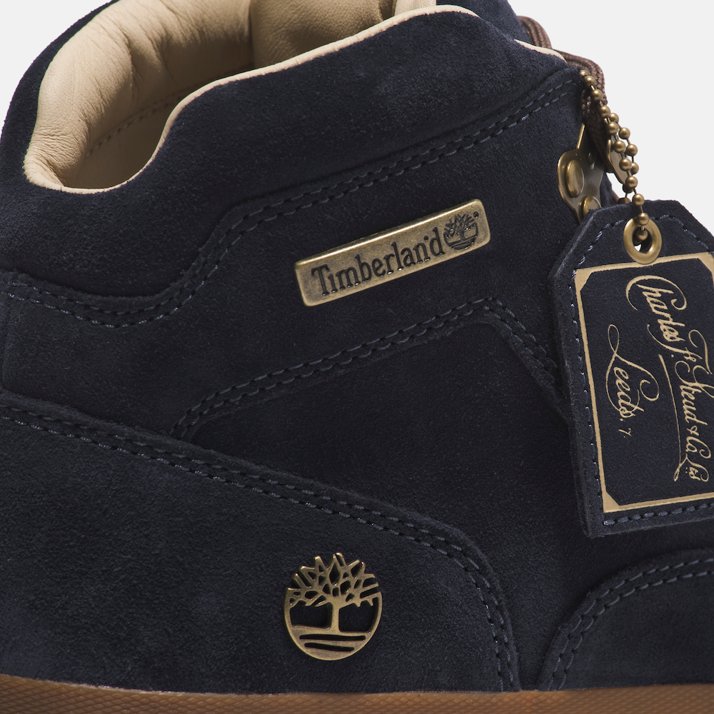 Timberland‚® C.F. SteadIndigo Suede Euro Hiker Mid Lace Up Boot for Men. Mid-cut, dark blue suede hiking boot crafted with premium leather by C.F. Stead ¢‚ Å¾¢. Features waterproof construction, supportive steel shank, lug sole for grip, and mid-ankle laces for a secure fit.