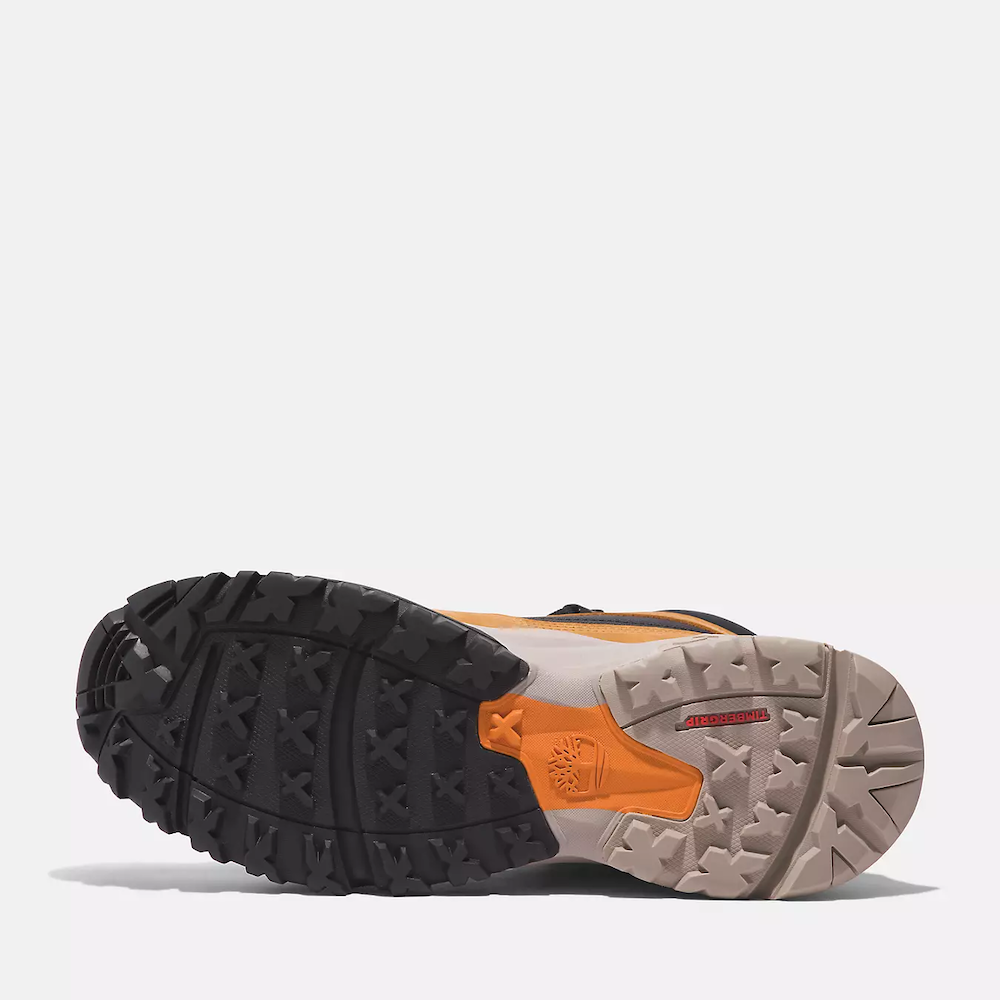 Wheat Timberland Motion Scramble Waterproof Boot. Leather & CORDURA upper for durability. Cushioned midsole & footbed. GreenStride soles for traction & eco-friendliness. TimberGrip outsole for grip. Mid-cut design. Lace-up closure. Wheat colour.