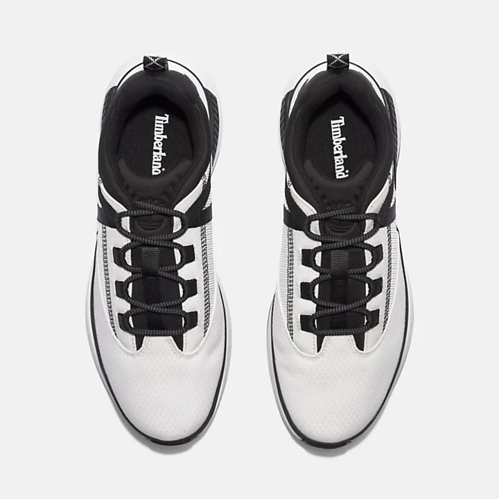 White Timberland Euro Trekker Lace-Up Low Trainer for Men. Upper made with ReBOTL fabric containing recycled plastic for sustainability and breathability. Lightweight OrthoLite footbed for cushioning. Cushioned midsole for shock absorption and energy return. Lace-up closure for secure fit. Clean white upper for versatile style. Durable rubber outsole for traction.