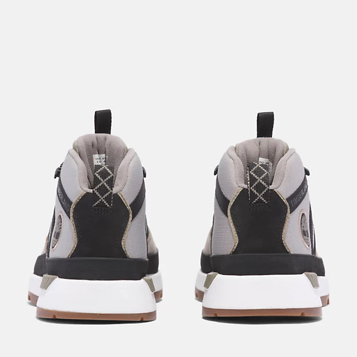 Grey Timberland Euro Trekker Lace-Up Trainer for Men. Upper with recycled materials for eco-conscious design. Breathable mesh lining for comfort. Lightweight OrthoLite footbed for cushioning. Compression-molded EVA midsole for flexibility. Lace-up closure for secure fit. 