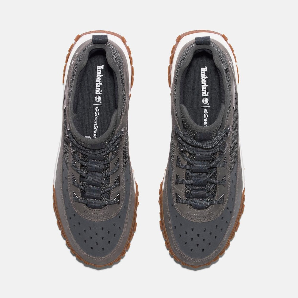 Grey Timberland¡ GreenStrideMotion 6 Waterproof Boot. Upper with recycled materials for eco-conscious design. TimberDrymembrane for waterproof protection. GreenStridecomfort soles for cushioning and sustainability. Durable rubber outsole with lugs for traction. Supportive mid-cut design for stability. Grey color for versatile style.