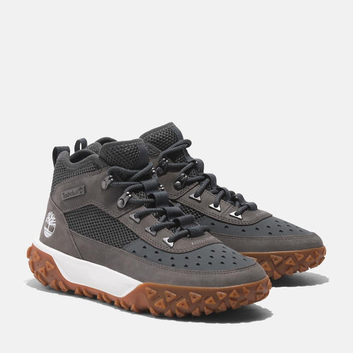 Grey TimberlandÃƒâ€šÃ‚Â¡ GreenStrideMotion 6 Waterproof Boot. Upper with recycled materials for eco-conscious design. TimberDrymembrane for waterproof protection. GreenStridecomfort soles for cushioning and sustainability. Durable rubber outsole with lugs for traction. Supportive mid-cut design for stability. Grey color for versatile style.