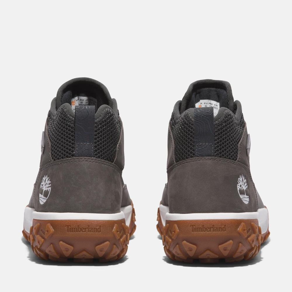 Grey Timberland¡ GreenStrideMotion 6 Waterproof Boot. Upper with recycled materials for eco-conscious design. TimberDrymembrane for waterproof protection. GreenStridecomfort soles for cushioning and sustainability. Durable rubber outsole with lugs for traction. Supportive mid-cut design for stability. Grey color for versatile style.