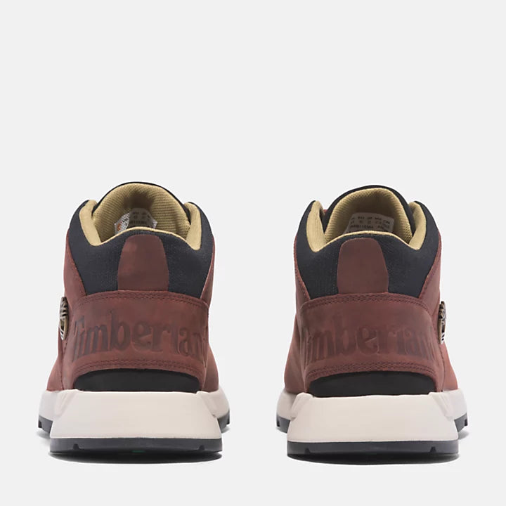 Medium brown Timberland Sprint Trekker Boot. Lightweight upper with water-resistant leather & breathable mesh. Flexible support, cushioned comfort. Durable traction for various terrains. Classic look