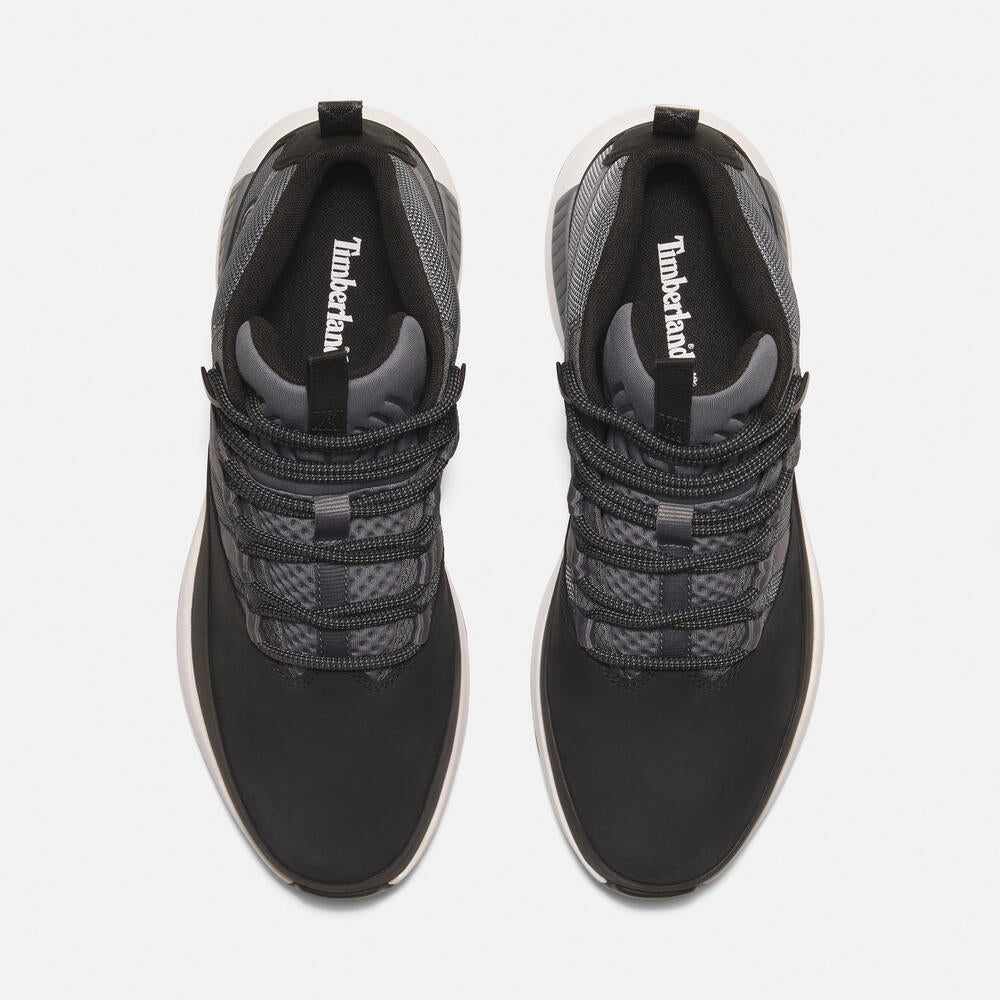 Timberland Euro Trekker Low Lace-Up Sneaker for Men in Black/Grey. Black and grey sneaker with lace-up closure. Comfortable and stylish for everyday wear.