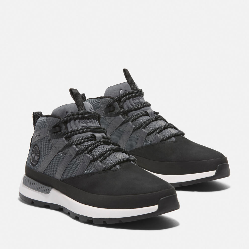 Timberland Euro Trekker Low Lace-Up Sneaker for Men in Black/Grey. Black and grey sneaker with lace-up closure. Comfortable and stylish for everyday wear.