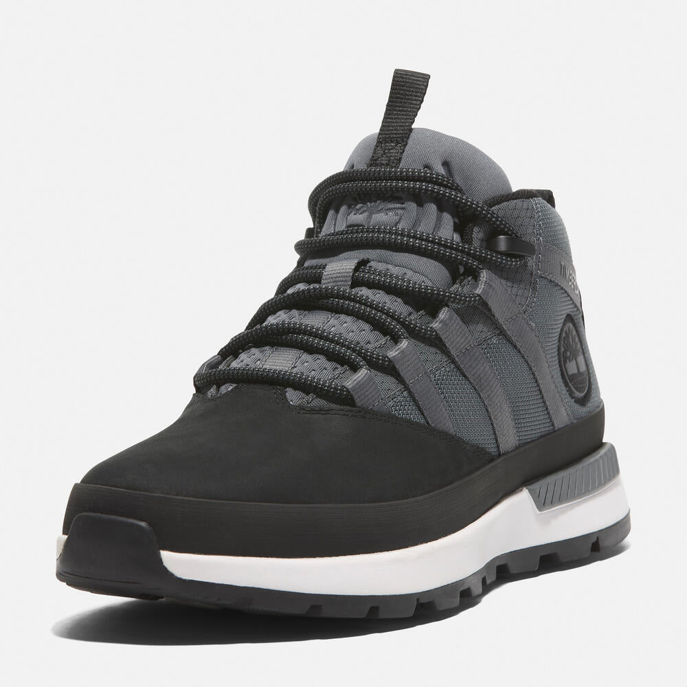 Timberland Euro Trekker Low Lace-Up Sneaker for Men in Black/Grey. Black and grey sneaker with lace-up closure. Comfortable and stylish for everyday wear.