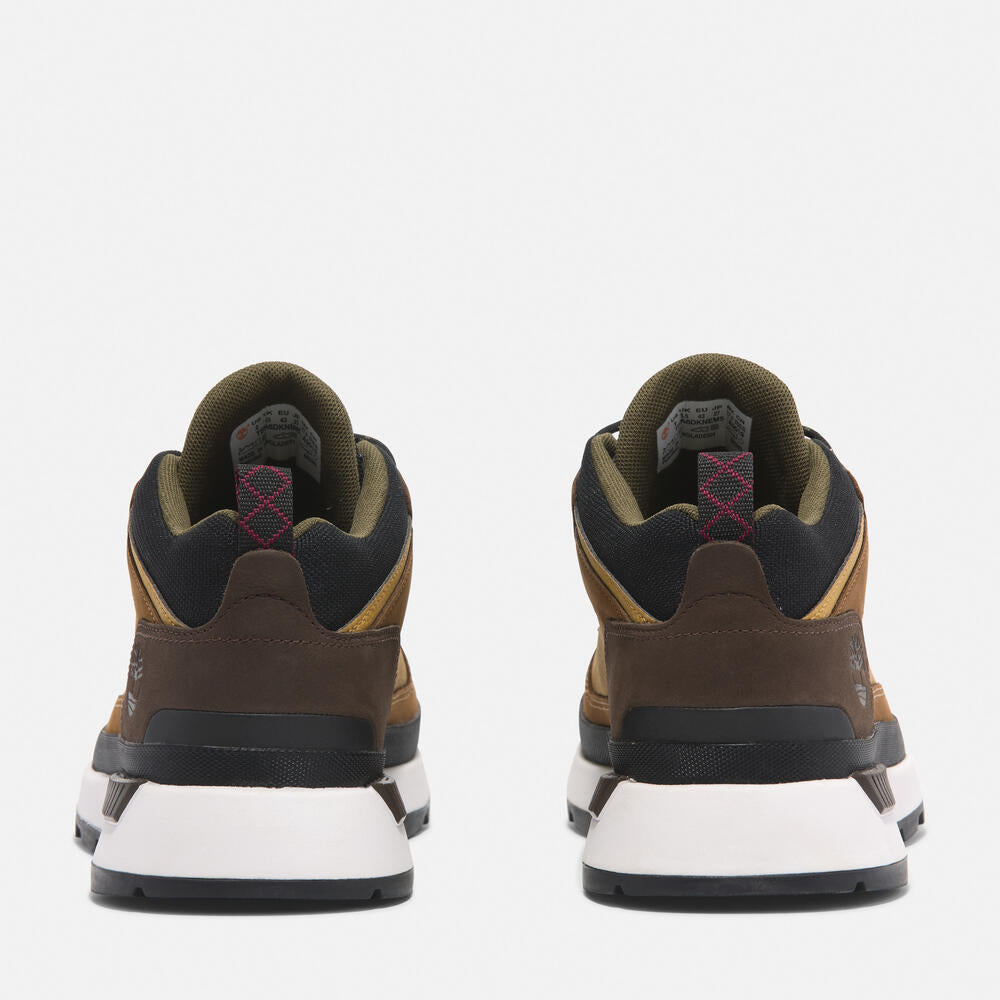 Timberland Field Trekker Mid Lace-Up Trainer for Men in Brown. Brown leather trainer with ReBOTL lining and OrthoLite footbed.  Mid-cut design for added support.