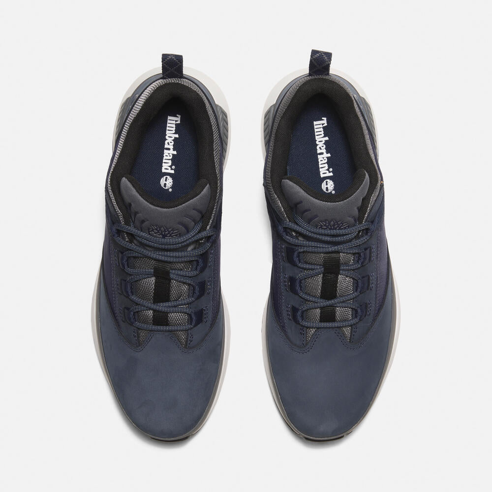 Timberland Euro Trekker Low Lace-Up Sneaker for Men in Navy. Navy sneaker with lace-up closure. Comfortable and stylish for everyday wear.