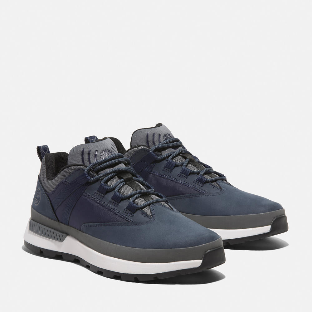 Timberland® Euro Trekker Low Lace-Up Sneaker for Men in Navy. Navy sneaker with lace-up closure. Comfortable and stylish for everyday wear.