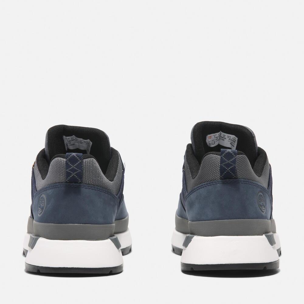 Timberland Euro Trekker Low Lace-Up Sneaker for Men in Navy. Navy sneaker with lace-up closure. Comfortable and stylish for everyday wear.