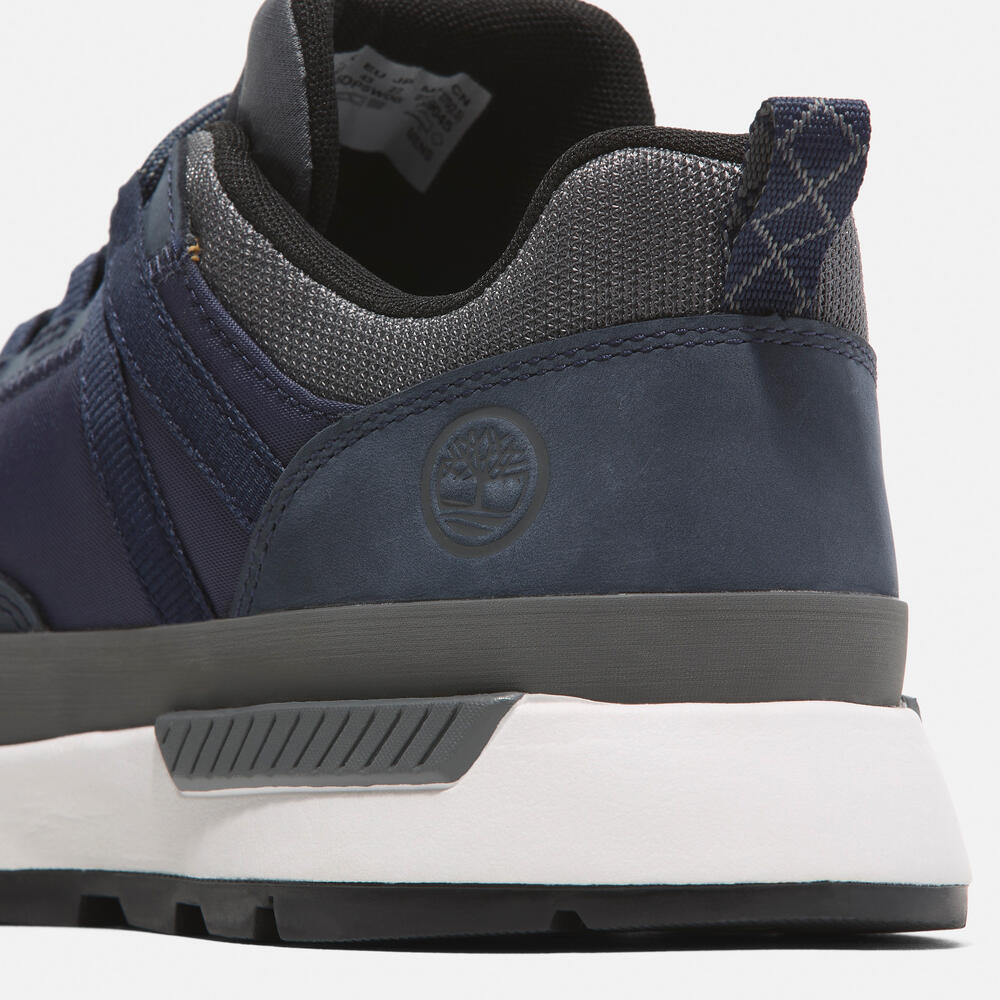Timberland Euro Trekker Low Lace-Up Sneaker for Men in Navy. Navy sneaker with lace-up closure. Comfortable and stylish for everyday wear.