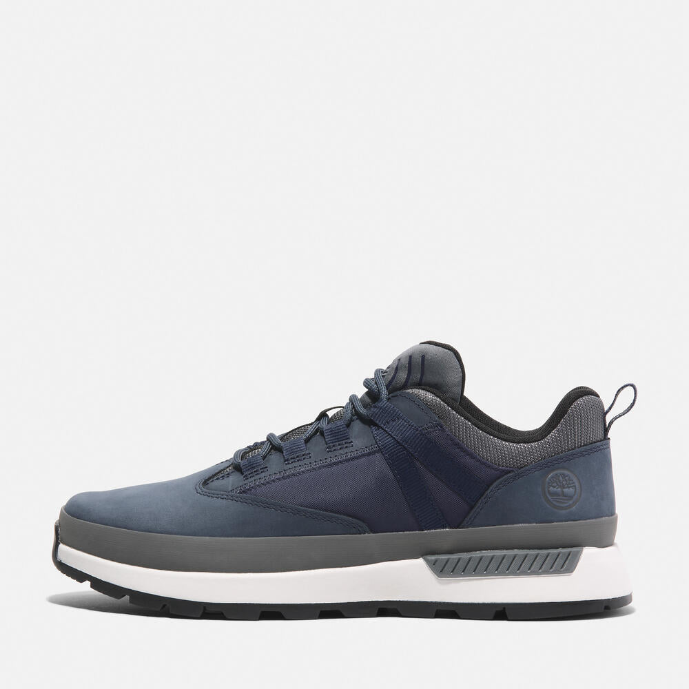 Timberland® Euro Trekker Low Lace-Up Sneaker for Men in Navy. Navy sneaker with lace-up closure. Comfortable and stylish for everyday wear.