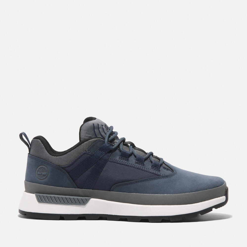 Timberland® Euro Trekker Low Lace-Up Sneaker for Men in Navy. Navy sneaker with lace-up closure. Comfortable and stylish for everyday wear.