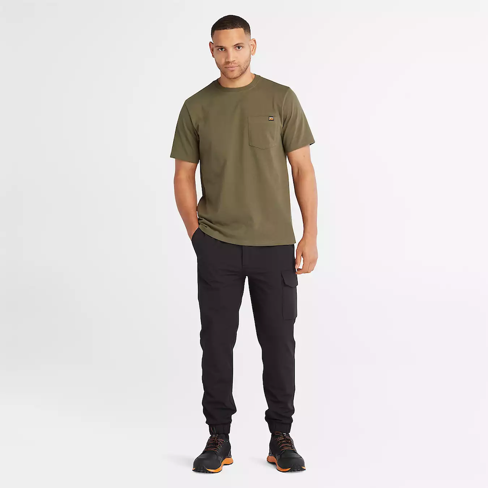 Olive Timberland PRO Core Pocket T-Shirt for Men. Cotton blend fabric for comfort and breathability. Reinforced stitching for durability. Classic crewneck silhouette. Chest pocket for utility. Machine washable.