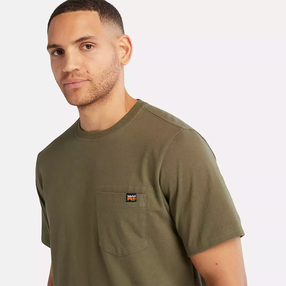 Olive Timberland® PRO Core Pocket T-Shirt for Men. Cotton blend fabric for comfort and breathability. Reinforced stitching for durability. Classic crewneck silhouette. Chest pocket for utility. Machine washable.