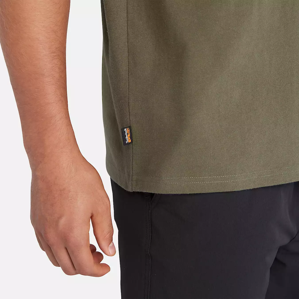 Olive Timberland® PRO Core Pocket T-Shirt for Men. Cotton blend fabric for comfort and breathability. Reinforced stitching for durability. Classic crewneck silhouette. Chest pocket for utility. Machine washable.