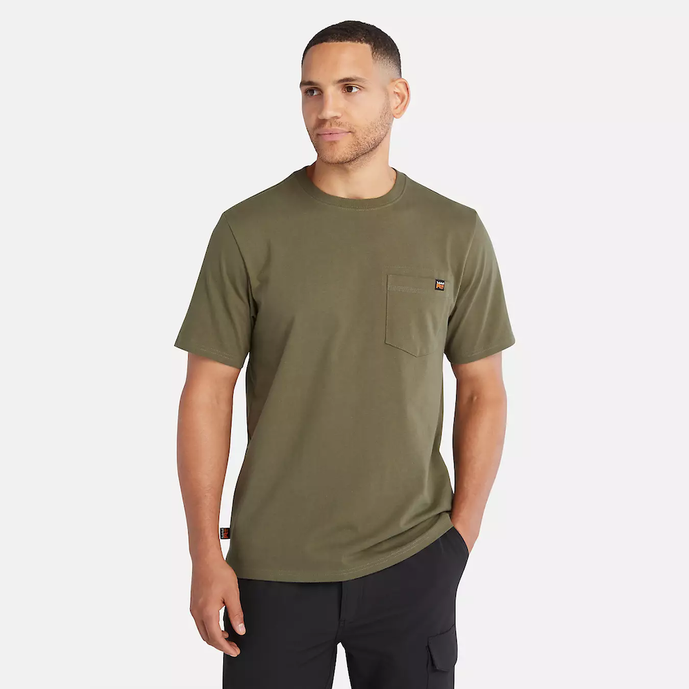 Olive Timberland® PRO Core Pocket T-Shirt for Men. Cotton blend fabric for comfort and breathability. Reinforced stitching for durability. Classic crewneck silhouette. Chest pocket for utility. Machine washable.