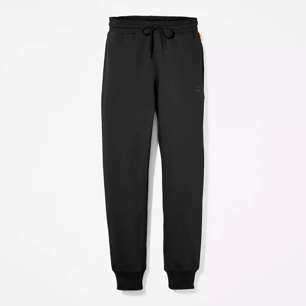 Black Timberland® Brushed Back Joggers for Women. Black sweatpants featuring a soft, brushed-back fabric for warmth and comfort.  These joggers offer a relaxed fit with an elasticated drawstring waistband, cuffed ankles, and two handy side pockets