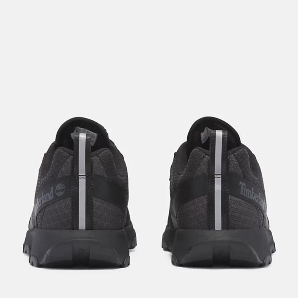 Black Timberland¡ Winsor Trail Sneaker. Recycled mesh upper for breathability and eco-friendliness. Cushioned comfort with OrthoLitefootbed. GreenStridemidsole for comfort and sustainability. Built for everyday adventures.