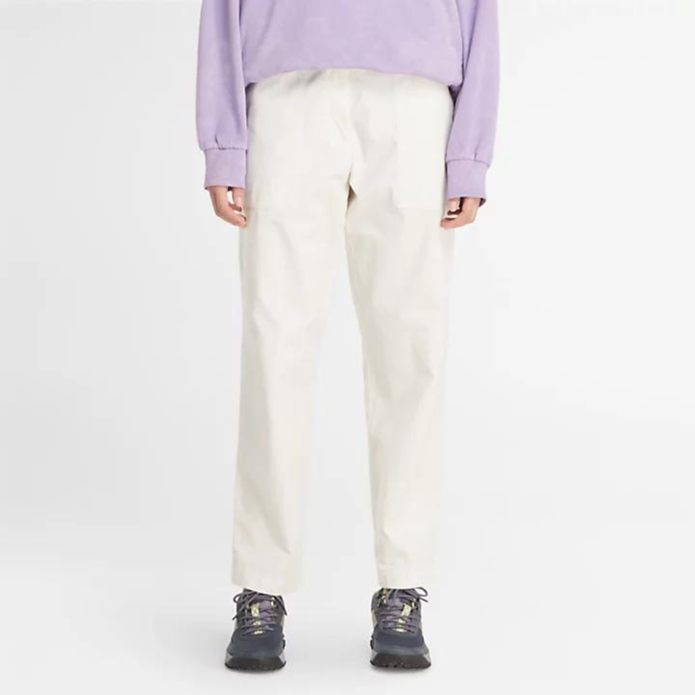 Vintage white Timberland¡ Utility Fatigue Trousers for Women. Heavy-duty cotton twill for durability. Straight leg with slight taper. Cargo pocket with flap and side pockets for storage. Button and fly closure. Fixed waist.