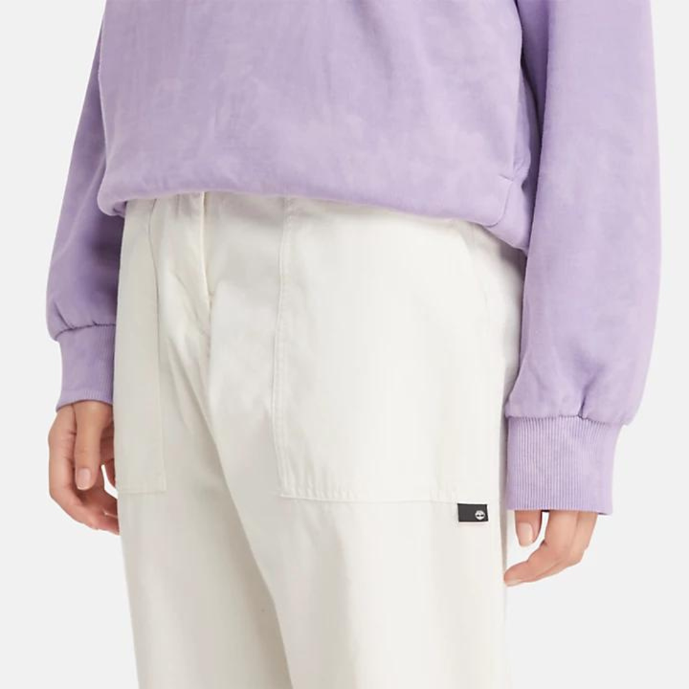 Vintage white Timberland¡ Utility Fatigue Trousers for Women. Heavy-duty cotton twill for durability. Straight leg with slight taper. Cargo pocket with flap and side pockets for storage. Button and fly closure. Fixed waist.