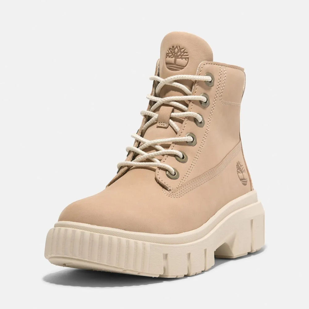 Timberland Greyfield Mid Lace-Up Boot for Women. Leather boot with lace-up closure, ReBOTL lining, and comfortable cushioning.  Versatile for casual wear and urban exploring.